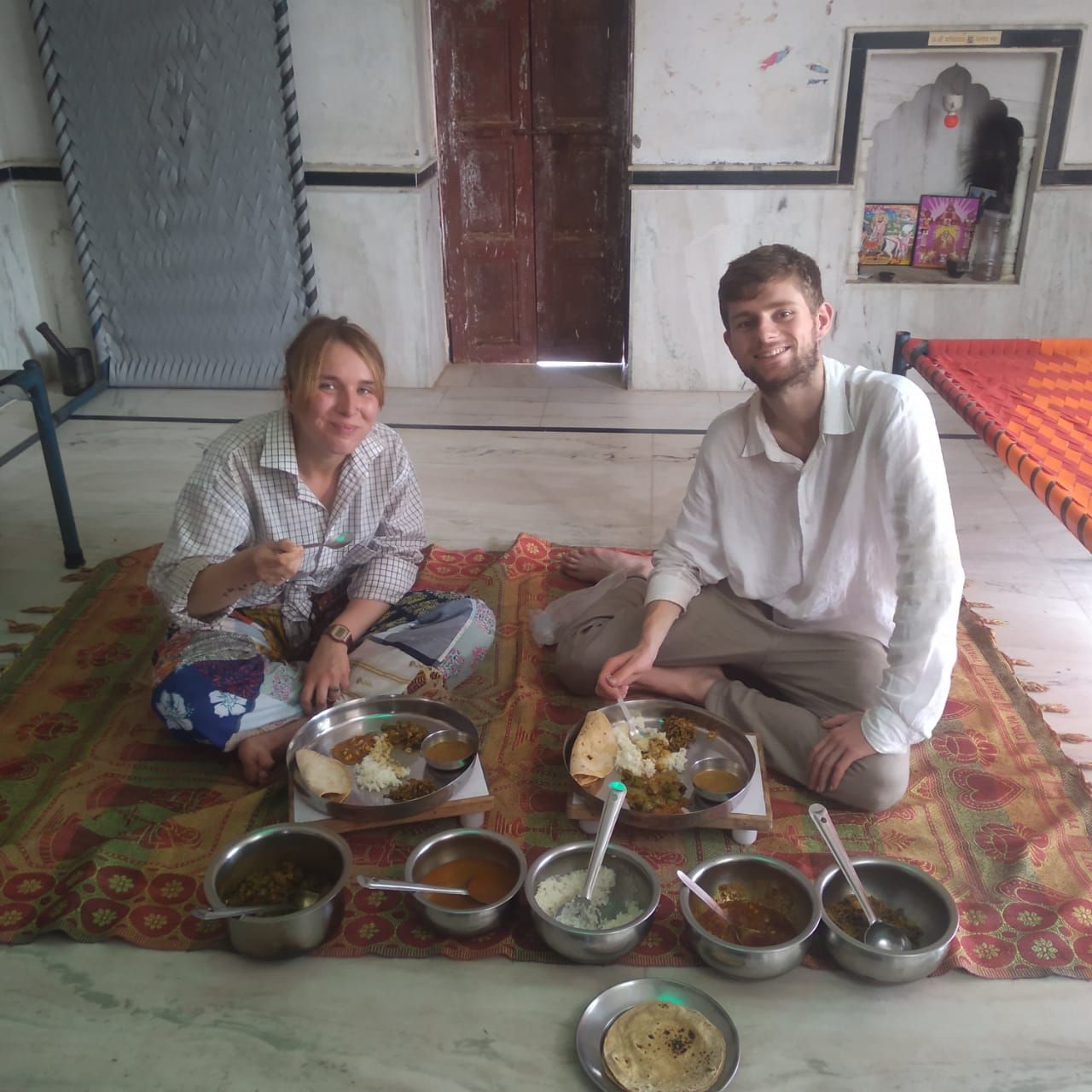 Traditional Rajasthani food served to guests at a desert camp in Osian